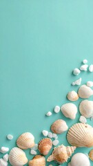 Seashells and pebbles arranged on turquoise surface ideal for background