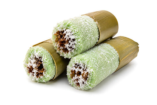 Indonesian kue putu bamboo steamed dessert isolated