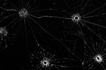 Fototapeta premium Bullet holes on black glass, overlay design background