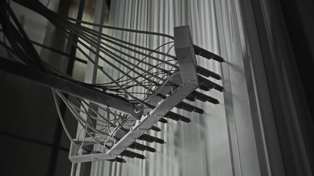 Powder Spray Details. Multiple Nozzles Disperse Powder Onto Suspended Metallic Components Distinctly