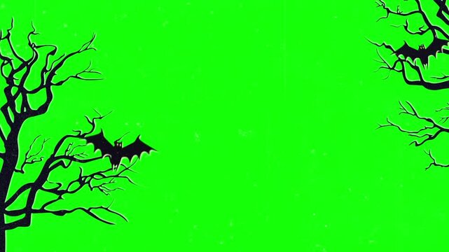Animated silhouettes of bats flying around bare haunted trees on a bright green screen background for halloween video editing and motion graphics compositing