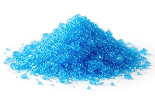 Bright blue copper sulfate granules isolated on plain white surface