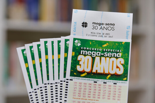 Photo of Mega Sena tickets and betting receipt celebrating thirty years of massive jackpots