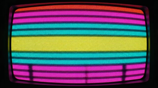 This colorful, vintage television displays vibrant horizontal bands of magenta, cyan, and yellow, creating a striking test pattern reminiscent of retro broadcasting signals on a dark screen
