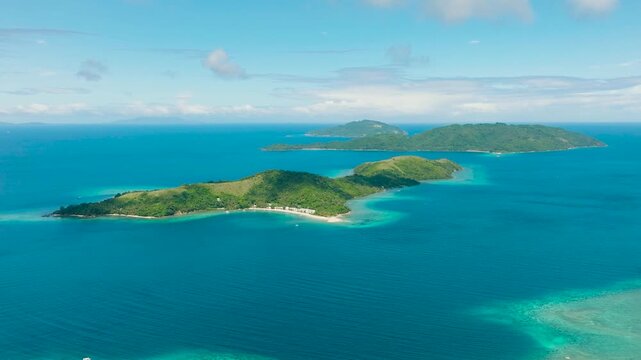 Tropical landscape of Islands with blue sea and corals. Logbon Island. Romblon, Romblon. Philippines.