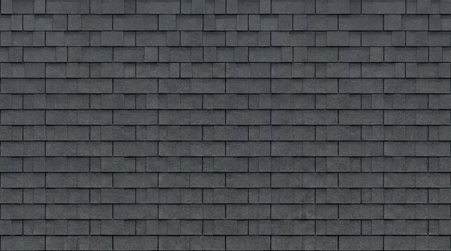 A dark gray asphalt shingle roof is presented. The roof is composed of rectangular tiles arranged in a repeating pattern.
