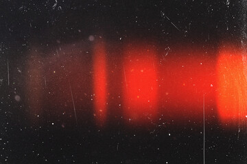 retro film overlay effect with scratch dust and red light leaks,retro grain noisy film distressed light leak flare on black background,black and white abstract background,Abstract old film texture © PT-studio