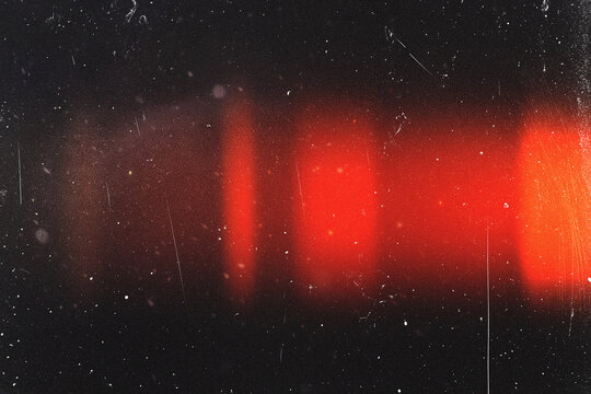 retro film overlay effect with scratch dust and red light leaks,retro grain noisy film distressed light leak flare on black background,black and white abstract background,Abstract old film texture