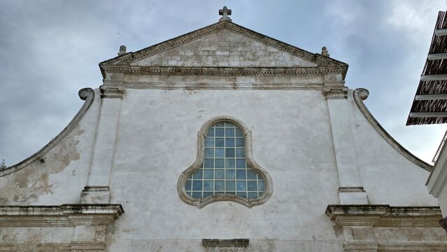 church of the holy sepulchre with falo stained glass in Monopoli city