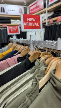 New Arrival sale sign at a clothing store