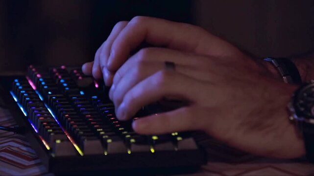 close up of hands typing on keyboard