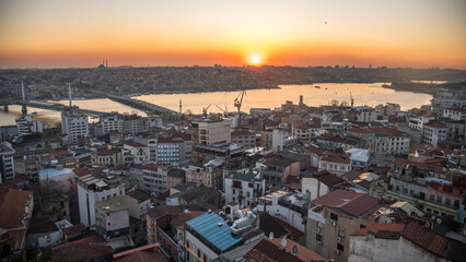 Obraz premium Sunset panorama view seen form Galata Tower with Hagia Sophia Blue Mosque Topkapi and another famous landmark in European or Asian parts of Istanbul Turkey 