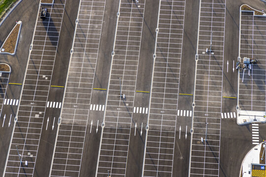 Melbourne Airport, Australia - 01 May 2026: Aerial view of the Value Short and Long Stay Car Park featuring empty parking bays, white road markings, and pedestrian crossings.