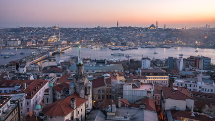 Obraz premium Sunset panorama view seen form Galata Tower with Hagia Sophia Blue Mosque Topkapi and another famous landmark in European or Asian parts of Istanbul Turkey 
