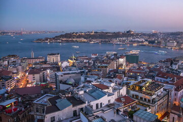 Fototapeta premium Blue hour panorama view seen form Galata Tower with Hagia Sophia Blue Mosque Topkapi and another famous landmark in European or Asian parts of Istanbul Turkey 