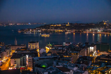 Fototapeta premium Blue hour panorama view seen form Galata Tower with Hagia Sophia Blue Mosque Topkapi and another famous landmark in European or Asian parts of Istanbul Turkey 