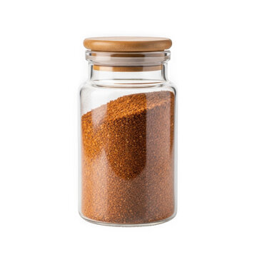 Glass jar filled with finely ground brown spice mixture