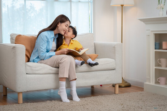 Joyful Mother-Son Reading Moments at Home