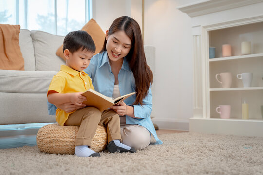 Joyful Mother-Son Reading Moments at Home