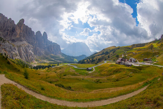 The Gardena Pass is a high mountain pass in the Dolomites of South Tyrol in northeastern Italy.