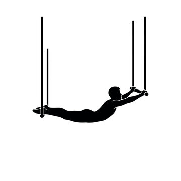 Silhouette of a gymnast performing on parallel bars.
