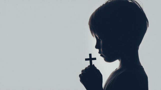 Christian child praying at sunrise, expressing hope and faith through worship, peaceful prayer moment with soft light.