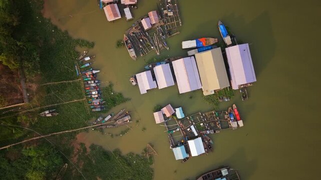 Top-down aerial of floating houses and boats, Chau Doc, Vietnam