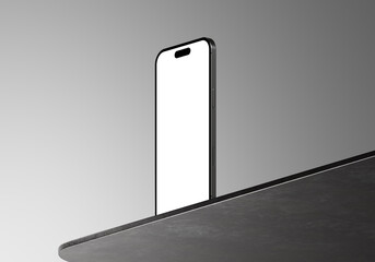 Modern mobile device with a pristine blank display, standing upright on an angled dark surface, offering a sleek template for app interfaces and digital content presentations © Dhirgham