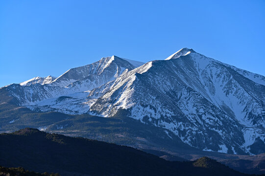 Detail of Mount Sopris summits under clear blue morning sky near Carbondale, Colorado.