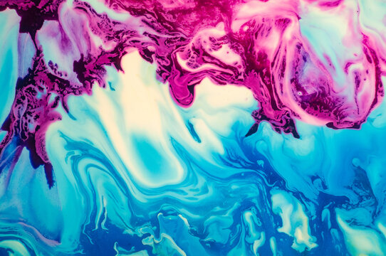 Colorful abstract art creation with swirling patterns in blue and pink shades