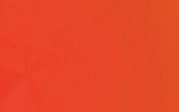 Vibrant solid burnt orange background texture