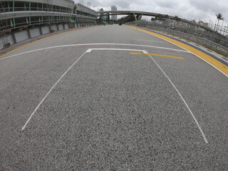 Fototapeta premium Singapore / December 2017: Pit lane and start finish line of the Formula One Racing track at Marina Bay Street Circuit. 