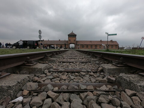 Oświęcim / Poland - April 27, 2019 - The Entrance Gate. Freight train tracks leading to Auschwitz II-Birkenau Nazi Germany's largest Concentration Camp, near Oswiecim, Poland.