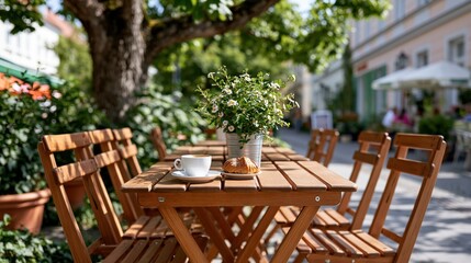 Obraz premium Outdoor cafe terrace with wooden tables and chairs, coffee and croissant