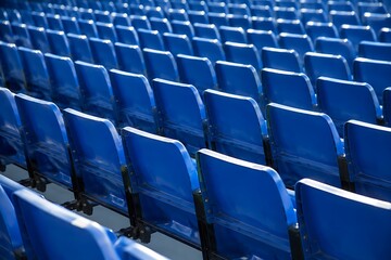 Naklejka premium Endless Rows of Blue Stadium Seats in Modern Sports Arena