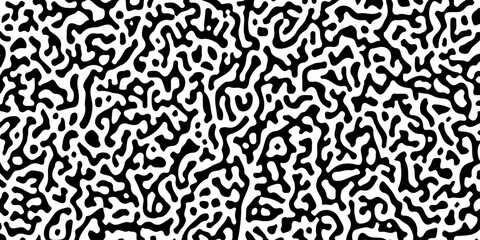 Fototapeta premium An abstract black and white pattern resembling organic shapes or cells creates a visually captivating and modern design.