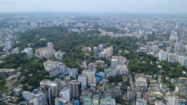 The aerial view of Chattogram city highlights the rapid urban expansion surrounding its remaining green hills and forests. Unplanned construction, hill cutting, and the destruction of trees.