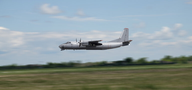 military transport aircraft in flight with selective focus