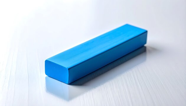 Solid blue rectangular prism object casting a subtle shadow on a textured white surface, clean studio shot
