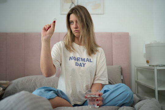 Examining Medication with a Strained Expression