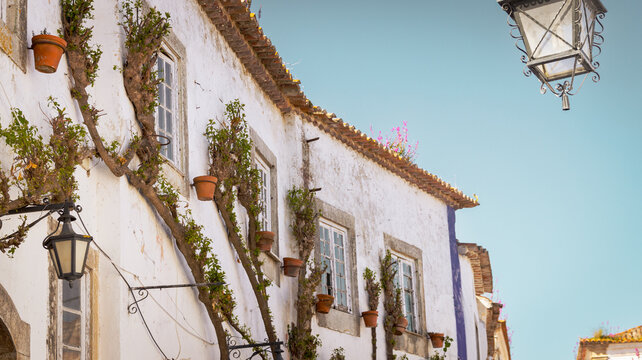 Walking around picturesque Obidos, Portugal