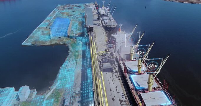 Grain loading in hold of bulk carrier ship with elevator crane. Port grain elevator. Industrial sea trading port bulk cargo zone grain terminal. Grain-transshipment. Smart industry. Smart logistics