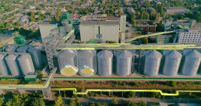 Grain Terminal System for Grain Storage and Transportation. Grain elevator terminal. Largest grain terminal. Metal grain silos on the premises of an agricultural enterprise. Smart industry