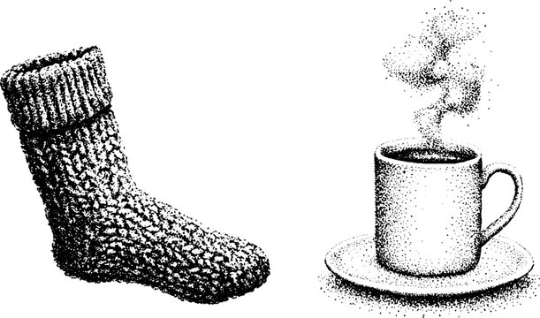 Wool sock beside steaming cup on saucer on white background