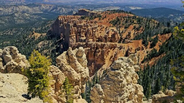  View from the rim of Bryce Canyon looking over the vast geological vista with tilt up to far distant valley