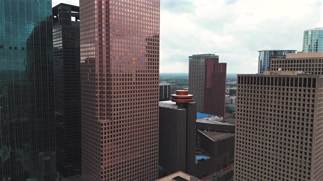 Drone flight through Houston Texas financial district between skyscrapers