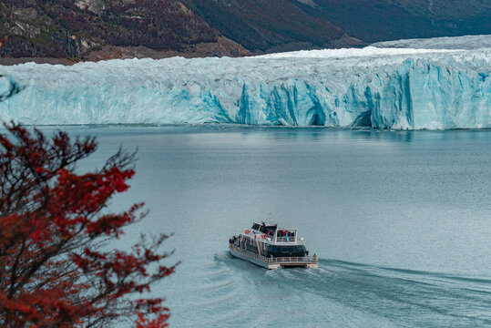 Tour Boat Sailing in Front of Perito Moreno Glacier in Patagonia
