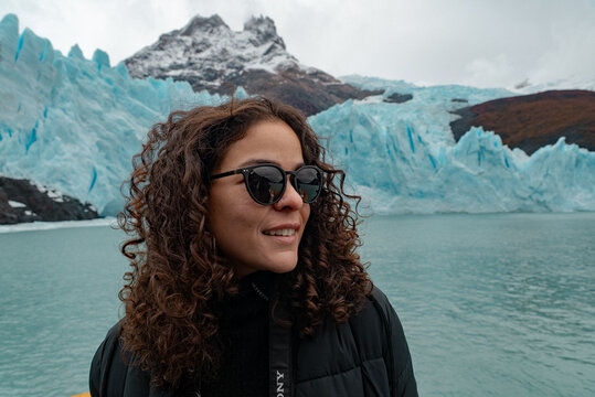 Female Traveler Portrait with Spegazzini Glacier in Patagonia