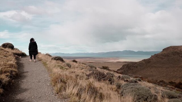 Woman Walking Toward Lago Viedma Viewpoint in El Chalten Patagonia