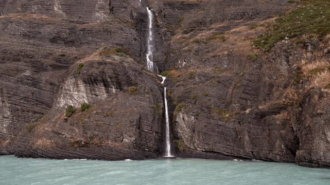 Glacial Waterfall Flowing Into Lago Argentino in Patagonia